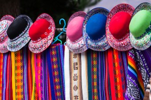 scarves and hats in a market in Peru