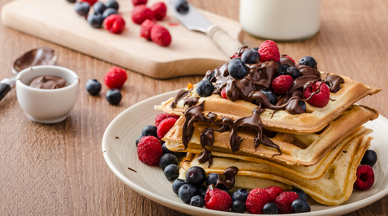 Belgian waffles with fruit and chocolate forest fruit all homemade delicious batter