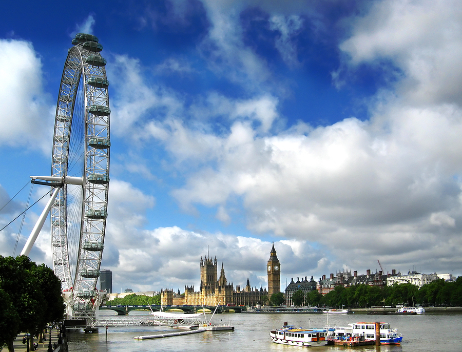 London Eye on the river Thames and Houses Of Parliament ** Note: Slight graininess, best at smaller sizes