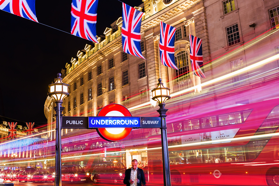 London UK - June 18 2016: Piccadilly Circus in London at night. Its status as a major traffic junction has made Piccadilly Circus a busy meeting place and tourist attraction