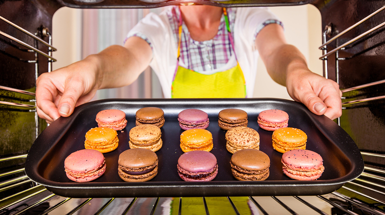 Baking macarons in the oven view from the inside of the oven. Cooking in the oven.